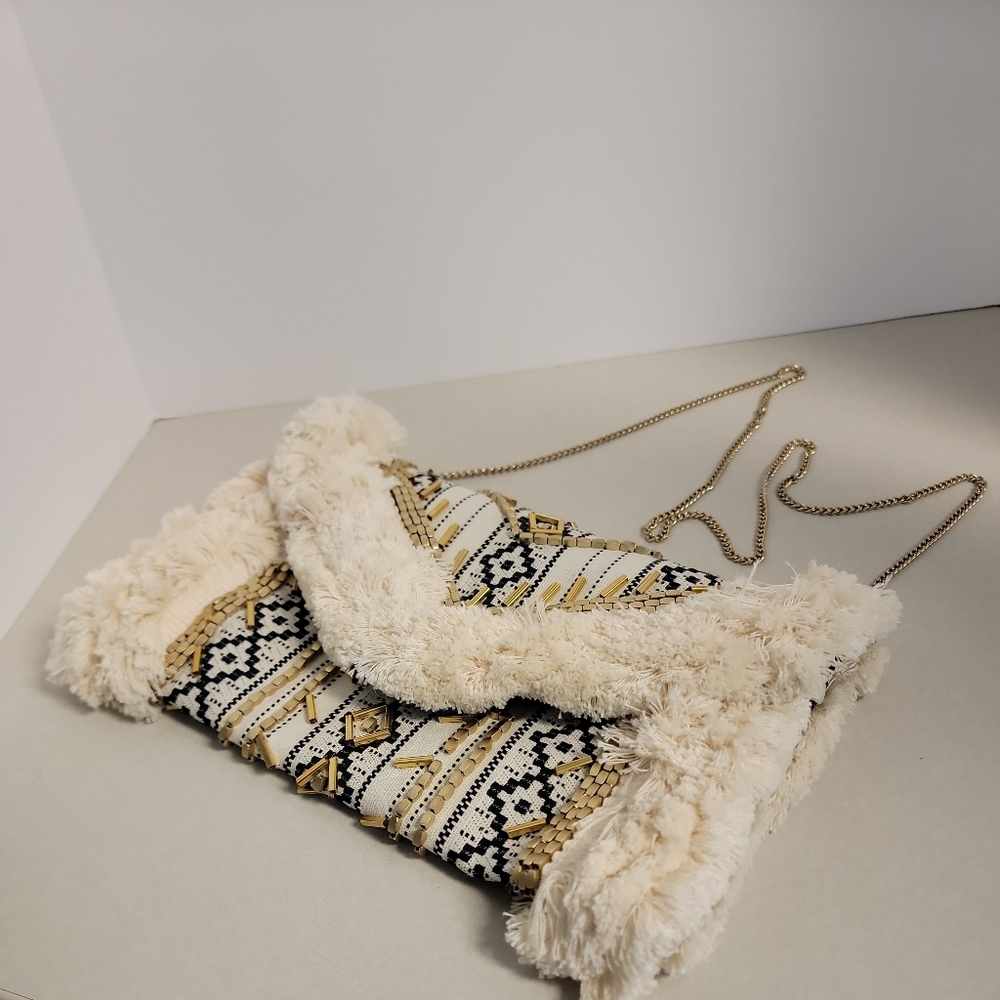 Aztec embroidered design with gold beads clutch is perfect